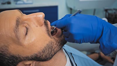 patient undergoing an oral surgery