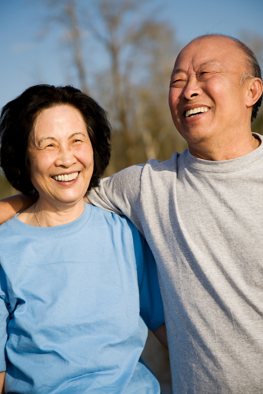 couple with dentures smiling together